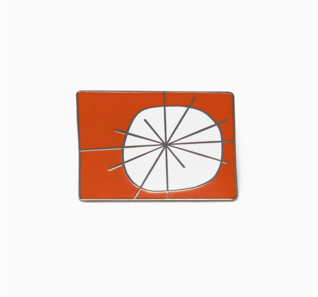 Atomic Orange Enamel Pin – AIA Design Shop